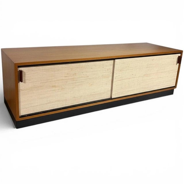 The Florence Knoll sideboard is a timeless teak wood sideboard designed to elevate mid century modern furniture...