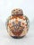 A richly hand painted ovoid ginger jar - Satsuma (Japan) in style. Brightly coloured oranges, royal blues and gold...