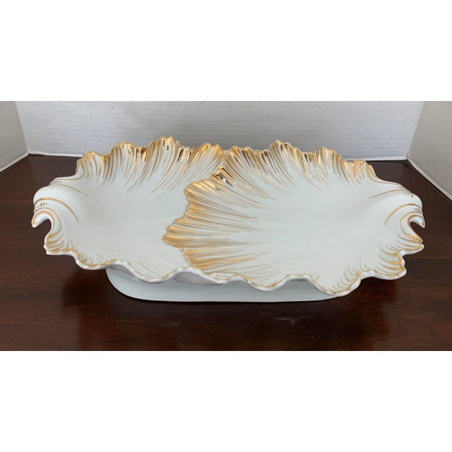 Exquisite large glossy white porcelain dish, heavily embellished with gold gilt, circa late 1800s. Marked Victoria...