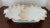 Exquisite large glossy white porcelain dish, heavily embellished with gold gilt, circa late 1800s. Marked Victoria...