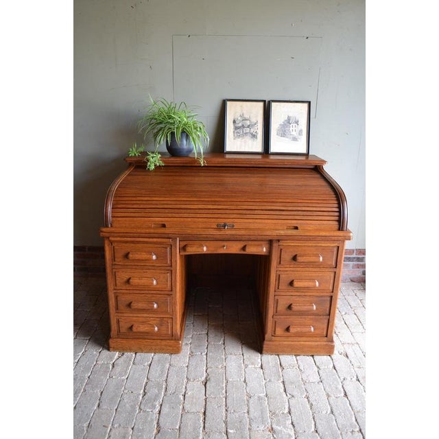 : 19th-century Dutch oak Art Deco roller shutter secretary desk. Manufacturer: De Phoenix Amsterdam. The height is 108 cm,...