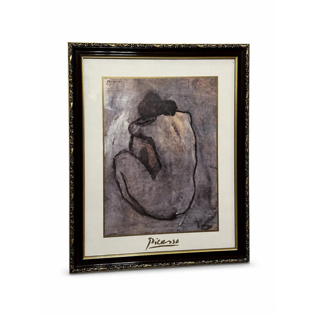 Framed decorative reproduction of Blue Nude, a work commonly associated with Pablo Picasso’s Blue Period. The original...