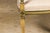 A French Directoire settee from the 19th century with soft creamish yellow painted finish, green accents, painted garlands...