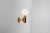 Golden aballs a wall lamp by parachilna dimensions: w 14 x d 18 x h 29 cm materials: handmade ceramic body, blown opal...