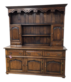 Mid 20th Century English Oak Paneled 5 Door & 3 Drawer Dresser and Rack With Shaped Frieze
