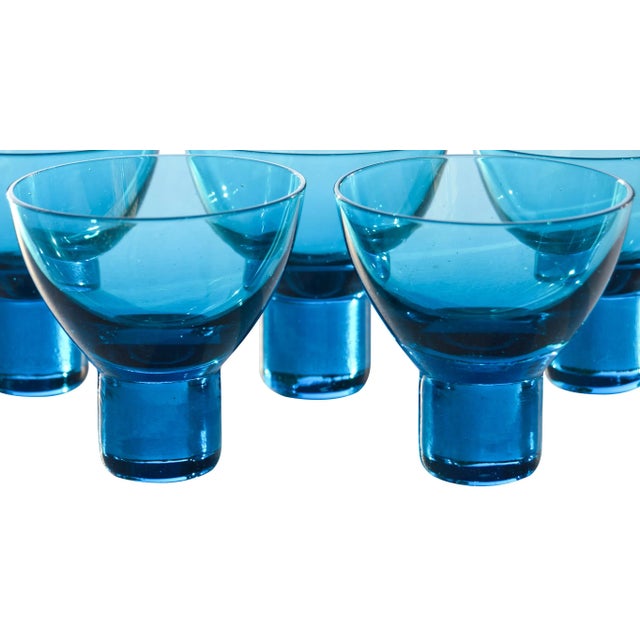 Set of five midcentury blue shot glasses. No maker's mark. This beautiful set ships within 1-2 business days from...