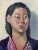 Vintage impressionist oil painting portrait of woman wearing a kimono. Painting is not framed, illegible signature on the...