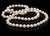 This elegant 18-inch strand features perfectly uniform 7mm Akoya pearls radiating with luminous pink undertones,...
