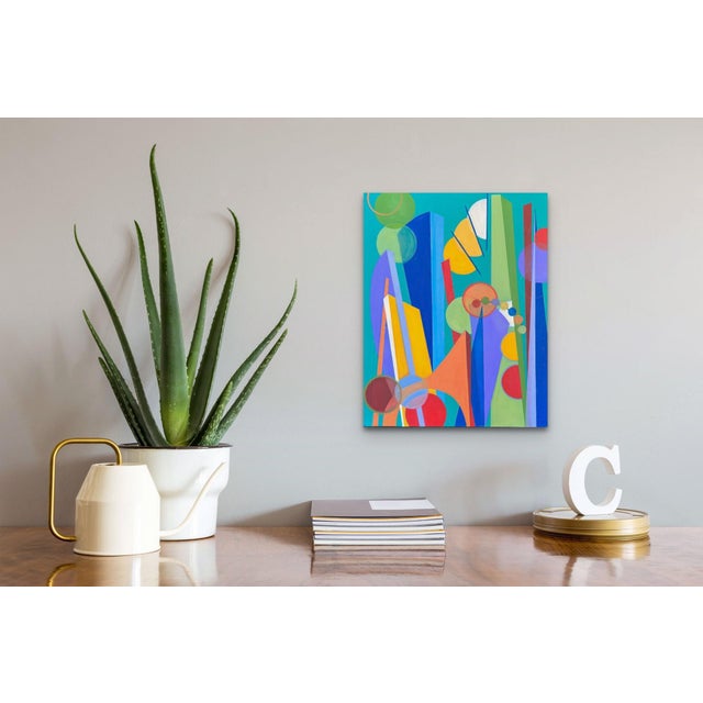 This artwork features a vibrant composition of geometric shapes and bold colors, creating a dynamic interplay between form...