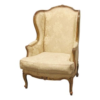 Antique Carved Wood Stuffed Wing Back Chair For Sale