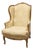 Antique Carved Wood Stuffed Wing Back Chair For Sale