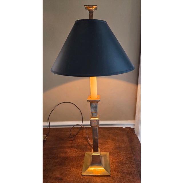 A stylish Chapman Table Lamp in great condition. It comes with a matte black shade with gold and black foil lining. The...