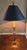 A stylish Chapman Table Lamp in great condition. It comes with a matte black shade with gold and black foil lining. The...