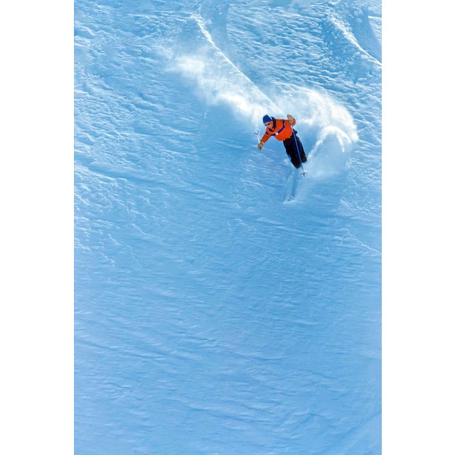 Downhill All The Way by Toni Frissell A downhill skier in powder snow shot for Sports Illustrated, Davos and Zermatt,...