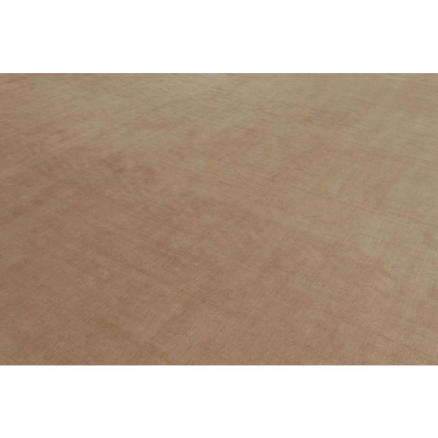 Hand-knotted in silk and cotton, this 10x18 contemporary oversized rug is an exciting new addition to Rug & Kilim’s...