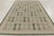 gHandwoven in wool and natural yarn, this 8x13 Scandinavian rug features a repeating geometric pattern in calming shades...