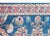 A beautiful hand-woven antique Persian Lilihan runner rug dating to the 1920s. This long runner features a vibrant deep...