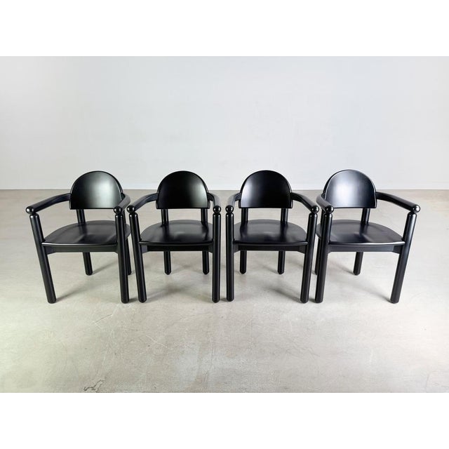 Set of 4 original vintage Rainer Daumiller armchairs from the 1960s. The vintage chairs (originally only with clear wood-...