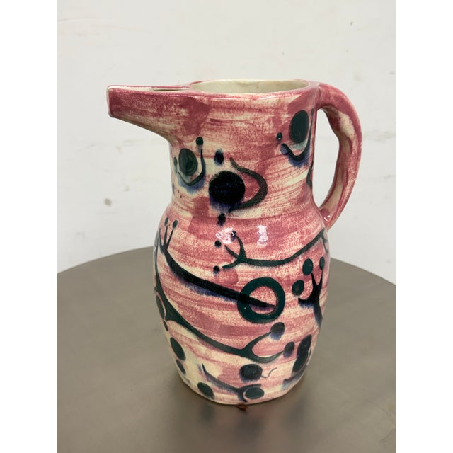 Design Plus Gallery presents a Stoneware Pitcher from Stonelain. Signed by Julio de Diego (1900-1979). This pitcher...