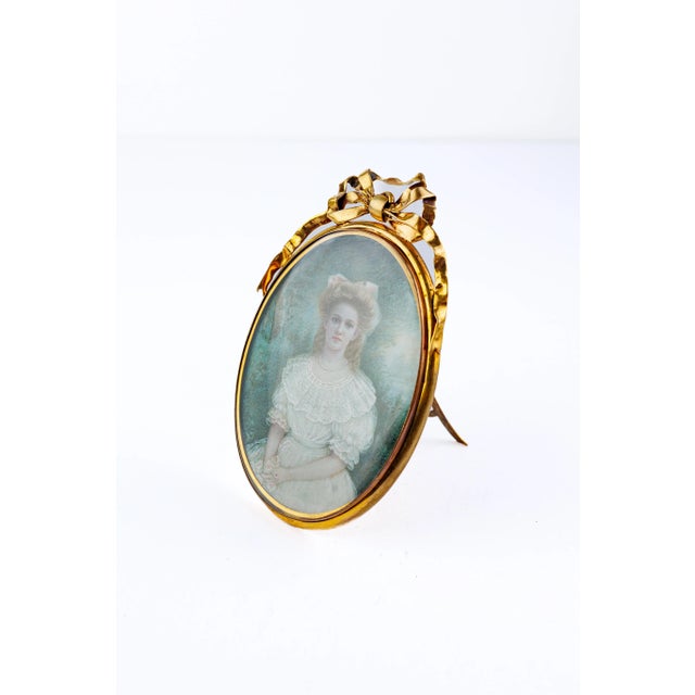 Exquisite French Portrait Miniature of a Woman in a White Gown painted on Ivory in a Gilt Frame. Circa Mid 19th Century