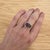 An ametrine rests in a blend of golden citrine and purple amethyst at the heart of this solid 14K yellow gold ring,...