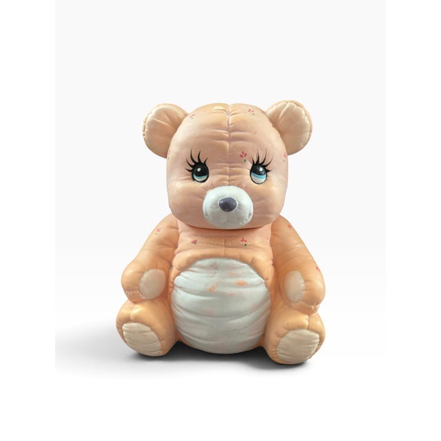 Charming vintage ceramic teddy bear cookie jar in a soft pink finish, featuring a sweet sculpted face and feminine...