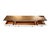 Handsome long console table featuring a warm dark-stained wood top contrasted with a distressed antique-white painted...
