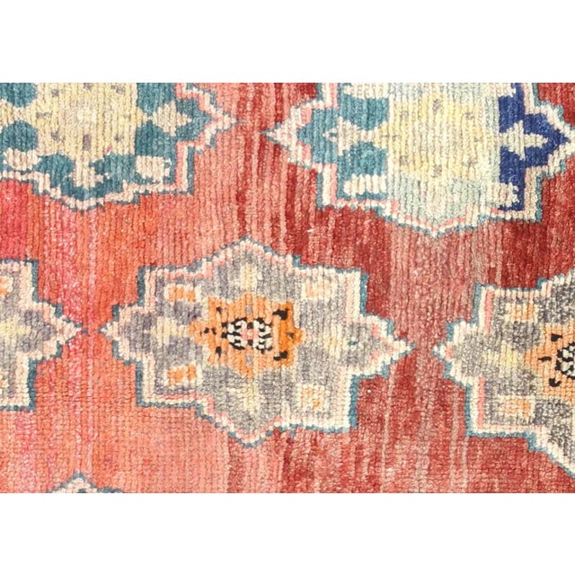 This Vintage Turkish Oushak Rug is handwoven with wool on a wool foundation in the Oushak region of Western Turkey,...