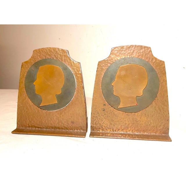 Up for sale is a wonderful pair of handmade antique Arts and Crafts figural bookends. They're made out of thick hand...
