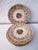 Mid-century set of six Atlas China porcelain dessert/salad/bread plates featuring a floral design in center with 22 karat...