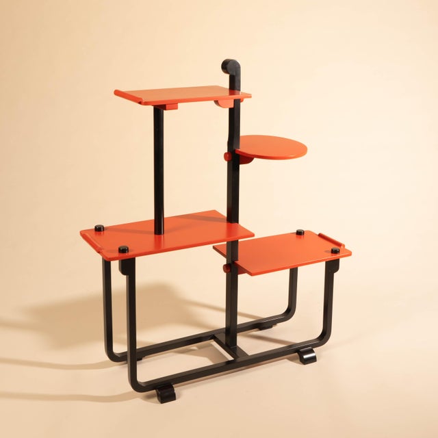 The flower stand is attributed to André Groult. Its design language is reminiscent of his folding side table from around...