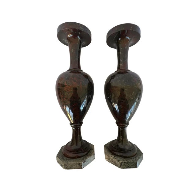 A pair of antique Cornwall vases carved from reddish brown jasper stone and date from the late nineteenth century. Each...