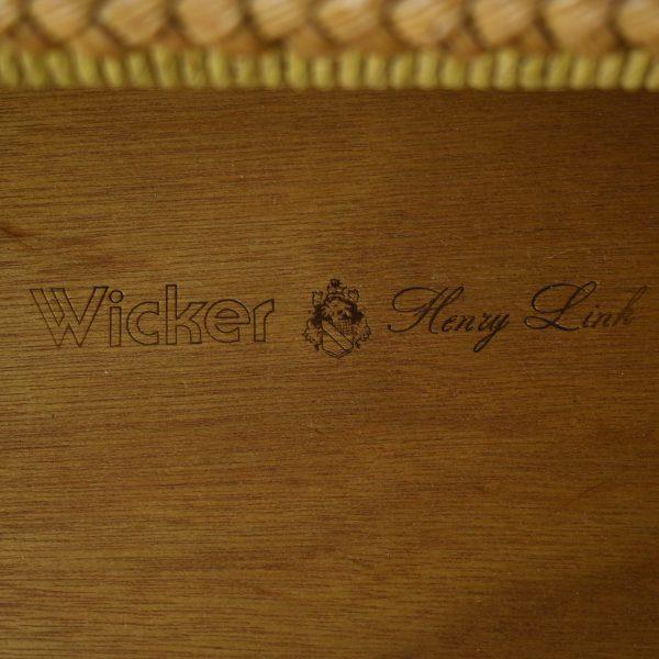 A vintage woven rattan dresser by Henry Link, compact in scale and full of island character. The woven case keeps the...