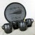 Handsome black clay or barro negro pottery hot chocolate set most likely from Oaxaca, Mexico consisting of 4 mugs, tray...