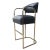 GREAT - Minor wear consistent with age and history Pair of limited edition polished brass bar stools upholstered in black...