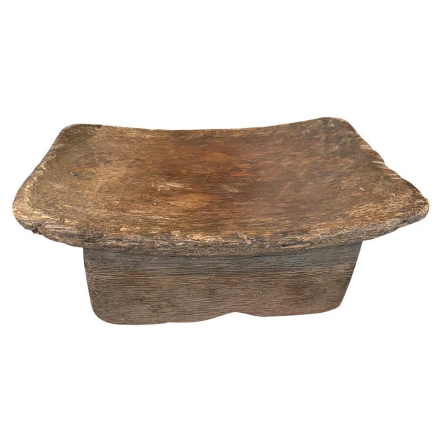 Lovely patina on this beautiful African stool hand carved from a single piece of wood. Great for placing a book or perhaps...