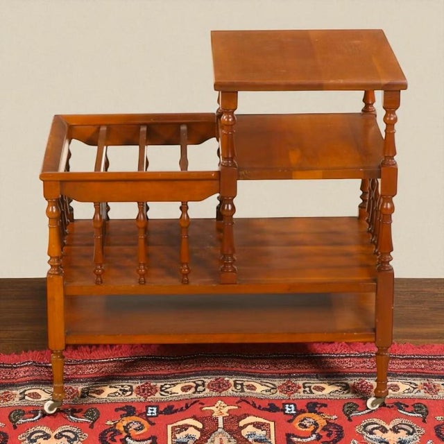 Sweet and functional colonial style table/ magazine rack combination. Made by the Forslund Brothers furniture company...
