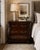 MOBILE-READY DESCRIPTION A richly detailed Bombay-style three-drawer chest featuring dramatic bombe curves, carved leaf...
