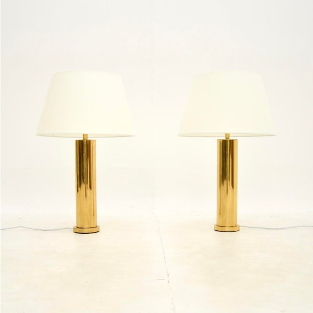 A large and impressive pair of vintage Swedish brass table lamps by Borens. They were recently imported from Sweden, they...