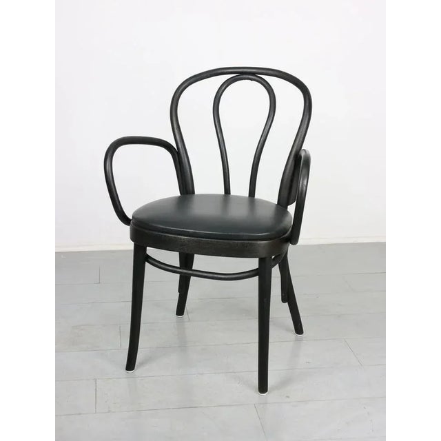 Black Leather No. 18 Chair with Arms by Michael Thonet for Thonet, in Very Good conditions. Designed before 1890 I have...