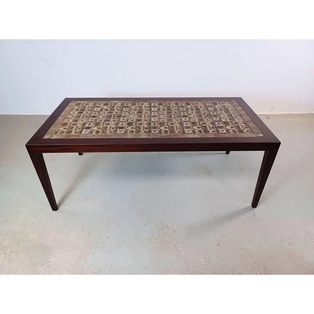 1960s Restored Severin Hansen Mahogany Coffee Table with Royal Copenhagen Tiles designed by Nils Thorsson The table has...