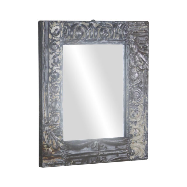 This one of kind wall mirror is handcrafted using antique 100 year old tin ceiling tiles. This mirror is ready to ship....