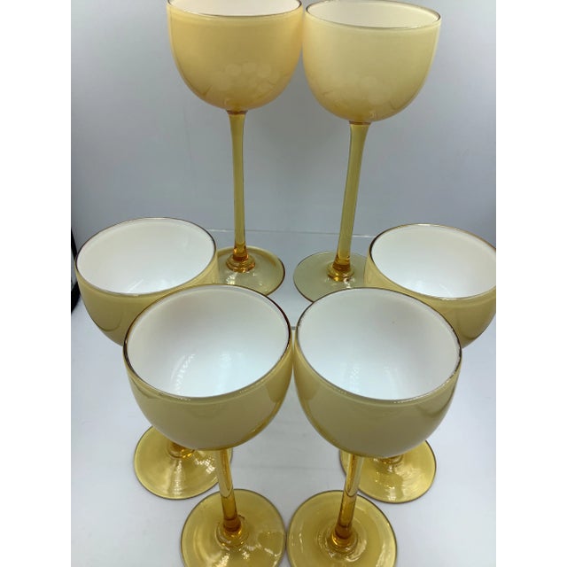 A rare and fabulous set of 60s Carlo Moretti Amber/Butterscotch tall stem cordial glasses. They present so beautifully...