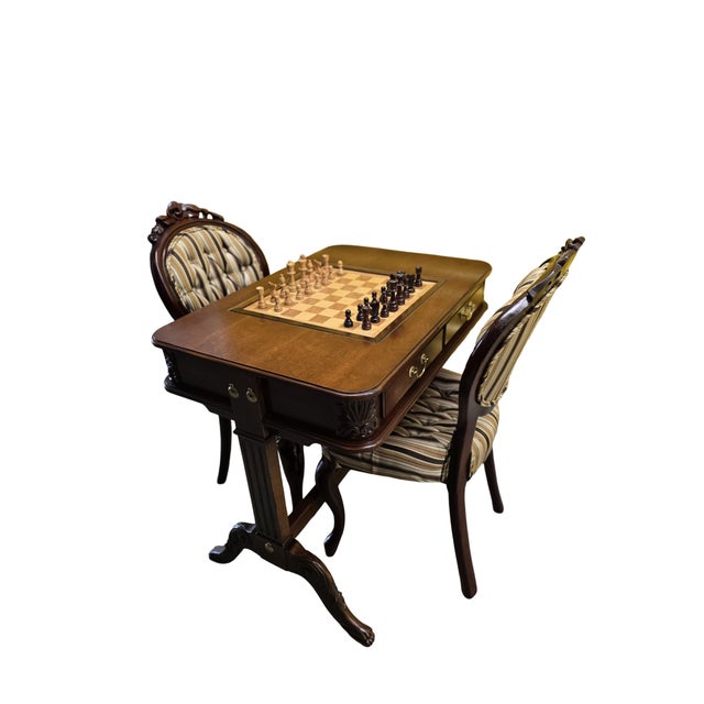 This super nice vintage chess and game table set includes a finely crafted wood table with an inlaid chessboard top and...
