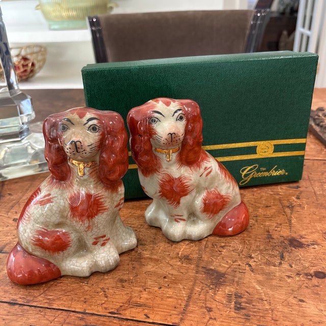An adorable pair of small 5.5" modern reproduction of old antique English Staffordshire Spaniel in mantle dogs. Purchased...