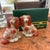 An adorable pair of small 5.5" modern reproduction of old antique English Staffordshire Spaniel in mantle dogs. Purchased...