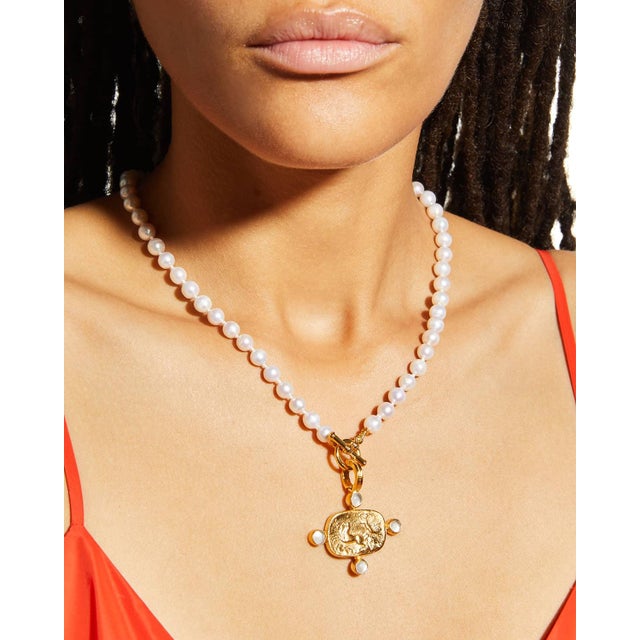 A freshwater pearl toggle necklace is paired with our chariot intaglio and pearl pendant. The ultimate in neutral. This is...