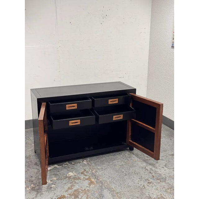 Design Plus Gallery presents the Dragon Swirl Bar Cabinet by Robert Kuo from McGuire Furniture. Its captivating swirled...