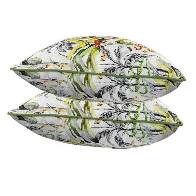 Bring the beauty of the tropics into your home with this vibrant and playful throw pillows. Featuring an exotic scene of...
