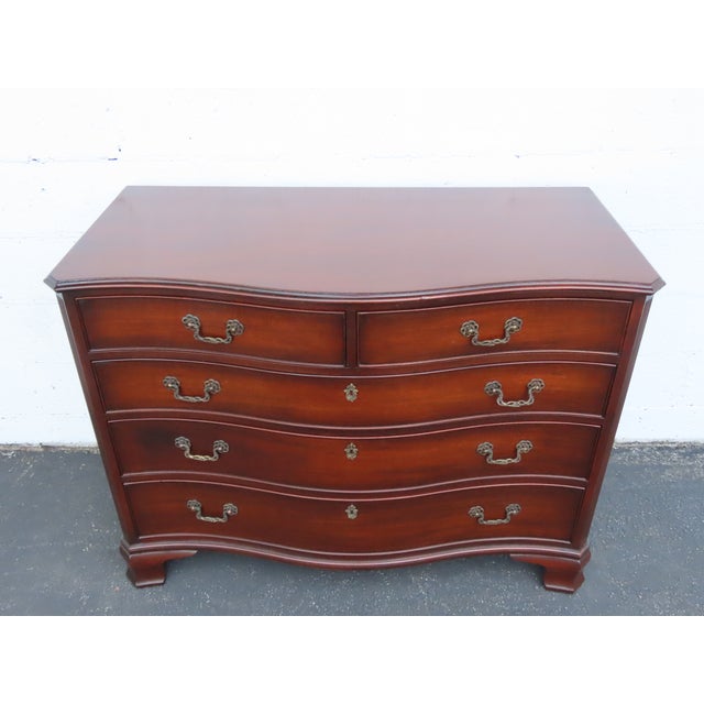 This magnificent Dresser is made of wood, mahogany, veneer, and metal. The Dresser was made by Kindel, it is stamped and...